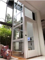 Plattformløft med Plexiglass lukket førerhus